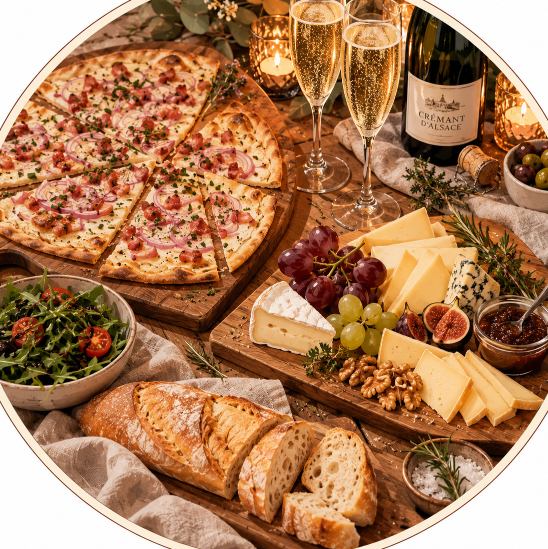 Flammkuchen, Käse und Sekt